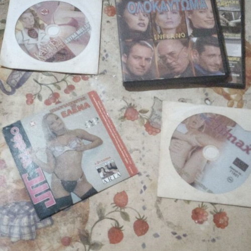 Package of four used erotic movies with Pamela Anderson DVD show