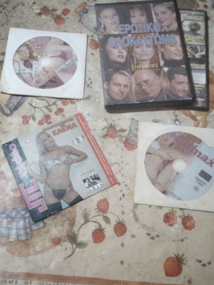 Package of four used erotic movies with Pamela Anderson DVD show