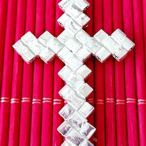 Cross used with white and black rhinestones