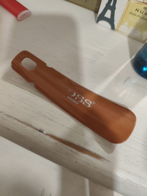 Boss Shoes plastic shoehorn used, small size