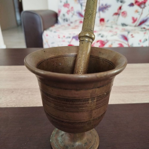 Vintage metal mortar and pestle used