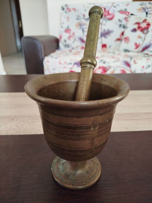 Vintage metal mortar and pestle used