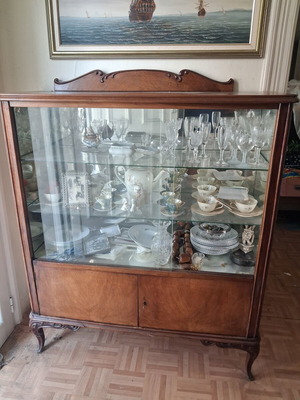Vintage buffet showcase used for displaying glasses and dishes