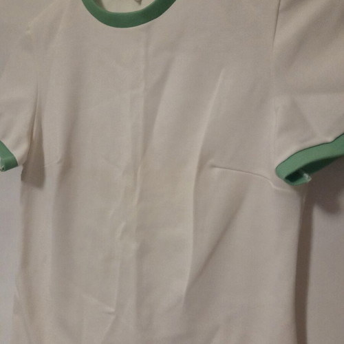 White blouse with green details, like new