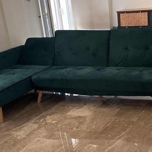 Green velvet sofa bed L-shape used with wooden legs