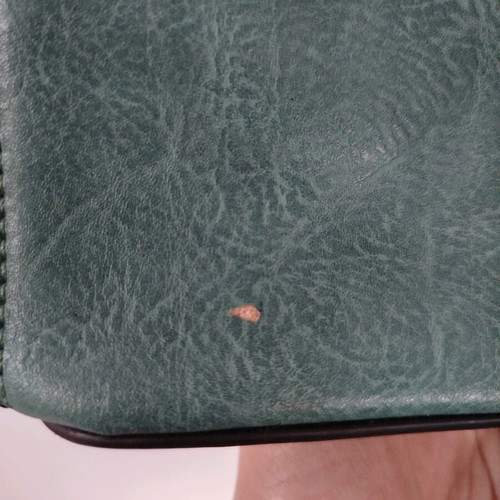 Turquoise shoulder bag with three compartments used