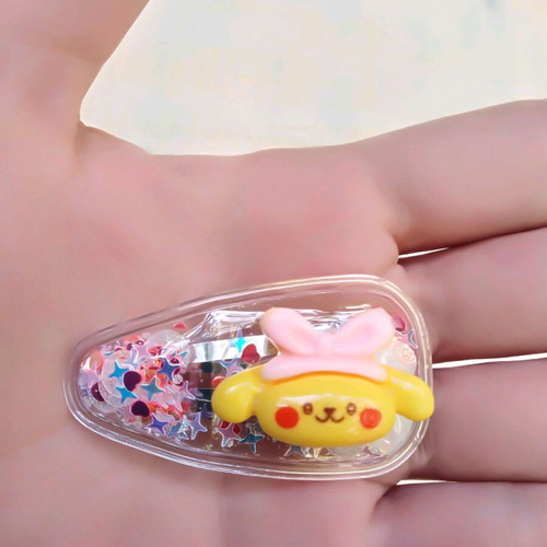 Κλιπ μαλλιών με χρυσόσκονη Pompompurin της Sanrio και mystery card καινούργιο
