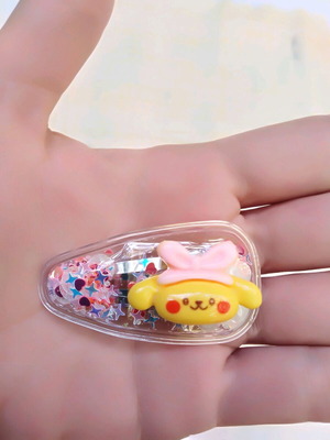 Κλιπ μαλλιών με χρυσόσκονη Pompompurin της Sanrio και mystery card καινούργιο