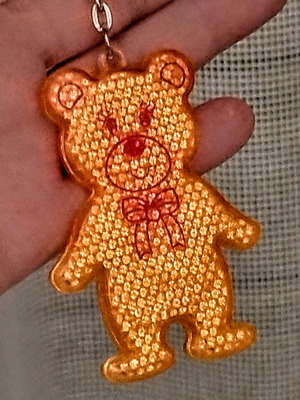 Reflective keychain Bear like new, yellow and orange