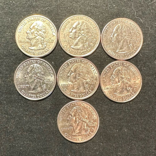 Lot of 7 used State Quarters of America