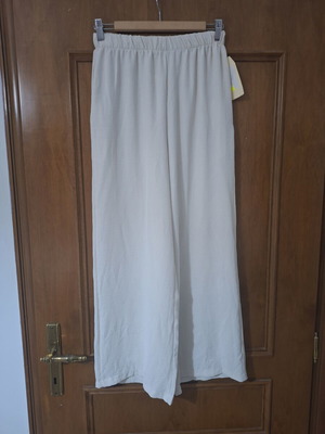 Women's palazzo pants new, broken white, one size