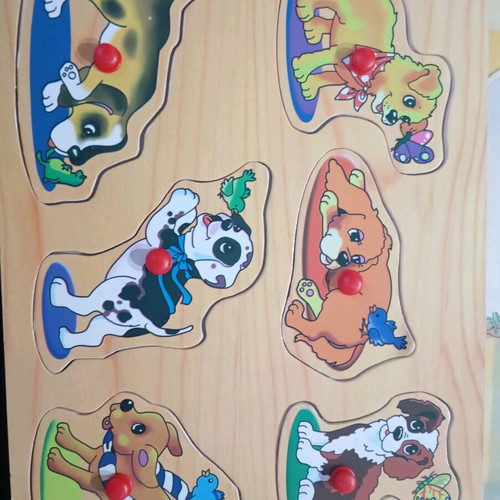 Wooden puzzle with puppies like new