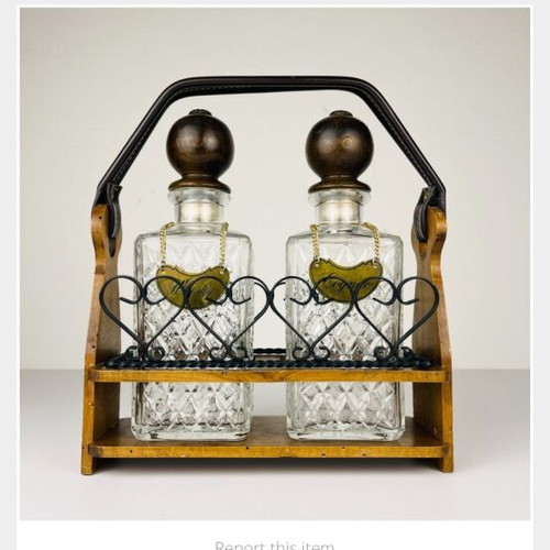 Vintage English decanters used in wooden stand for gin, cognac, whisky