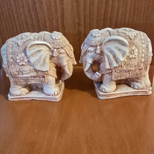 Pair of decorative elephants used with detailed embossed design