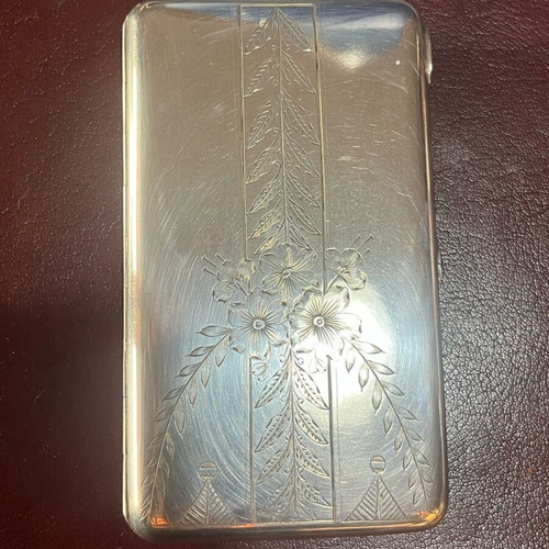Silver cigarette case used with red stone and gold plating