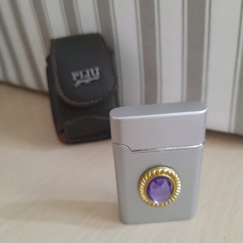 Lighter with purple gem in leather case new