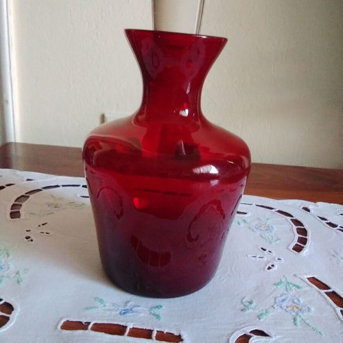 Red bottle like new with semi-crystal stopper