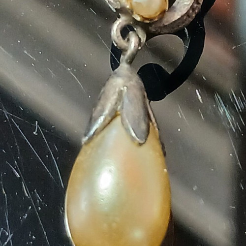 Vintage earrings with pearls used, silver color