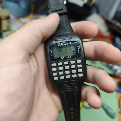 Kenko calculator watch, black plastic