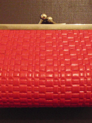 Small red wallet with gold clasp used