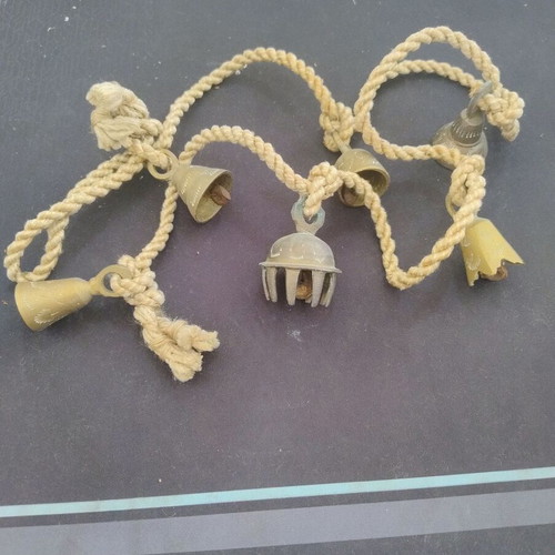 Vintage brass bells tied on rope used
