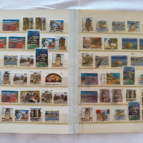 Stamp album collection about 615 stamps like new