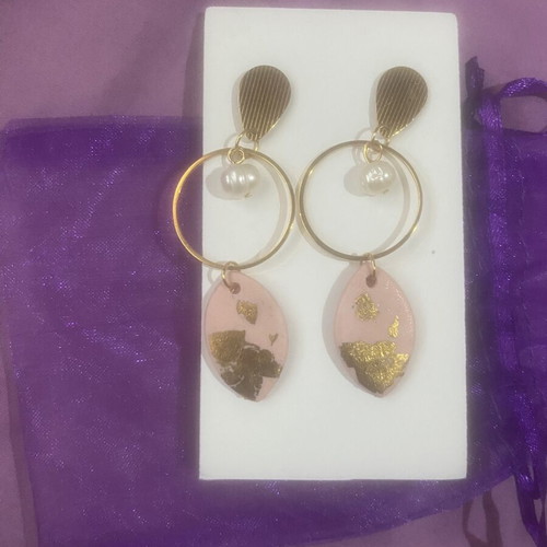 Women's earrings new, pink gold color