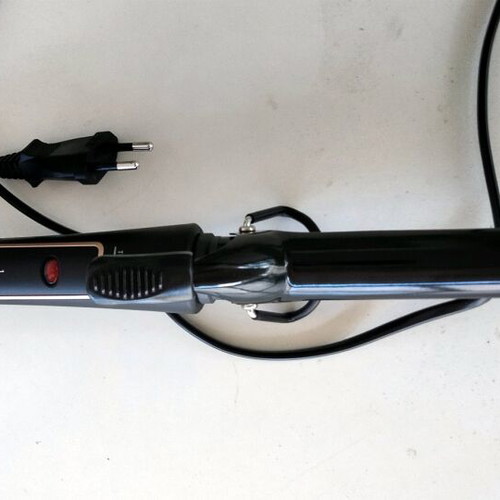 Rowenta CF3319 Copper Forever hair curling iron, new