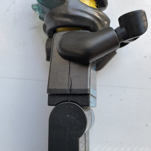 Lego mini figure with broken torso