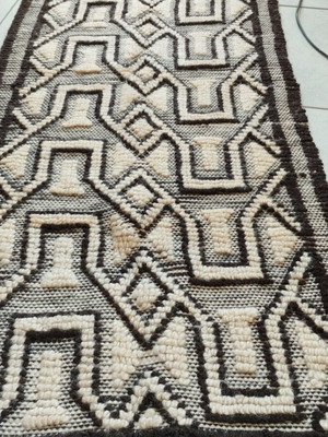 Woven wool rug used, dimensions 1.40×0.53