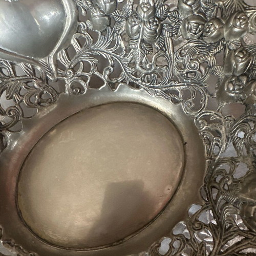 Silver centerpiece used with small bouquet of roses design