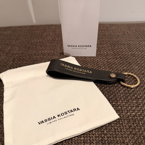 Leather keychain Vassia Kostara Limited Edition like new, black and gold
