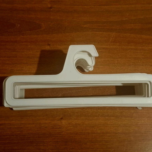 Small white hangers like new, pack of 15 pieces