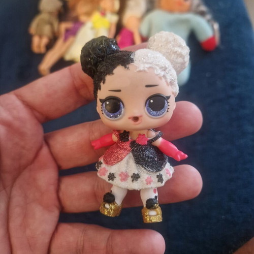 LOL Surprise Heartbreaker figure with black and white glitter hair