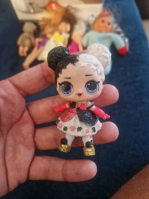 LOL Surprise Heartbreaker figure with black and white glitter hair