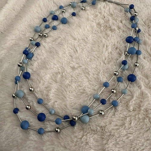 Silver necklace like new with blue beads in various shades