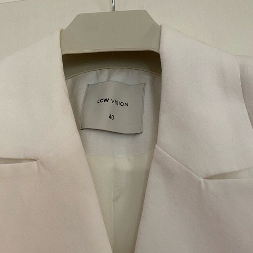 White jacket like new size large Waikiki