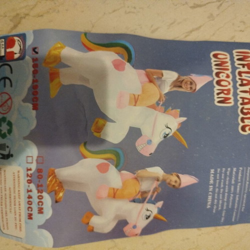 Inflatable unicorn costume like new with blower pump