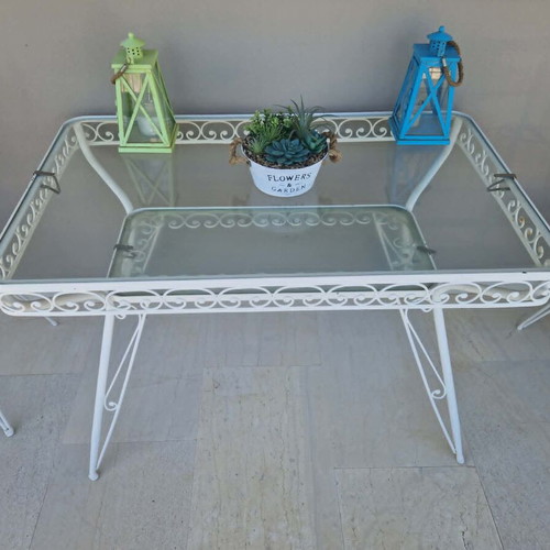 Wrought Iron Outdoor Set used, 4 chairs, 1 armchair, glass table