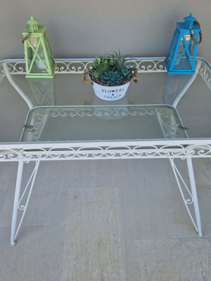 Wrought Iron Outdoor Set used, 4 chairs, 1 armchair, glass table