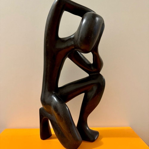 African figure of a thinking man used, solid wood