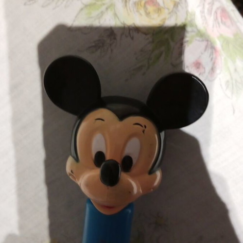 Disney umbrella used with blue Mickey Mouse handle, multicolored