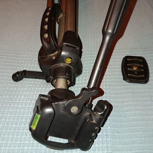 Folding photographic tripod used