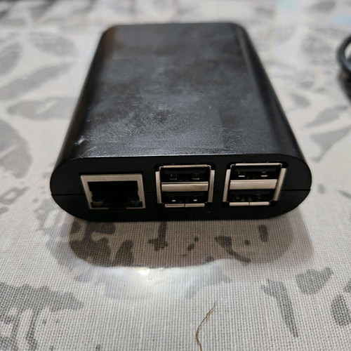 Raspberry Pi model b like new with case and usb charging cable