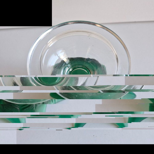 Decorative tulip-shaped ornament made of green matte glass with clear base like new