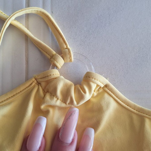 Dream Sport yellow pastel crop top with halter neckline size M like new