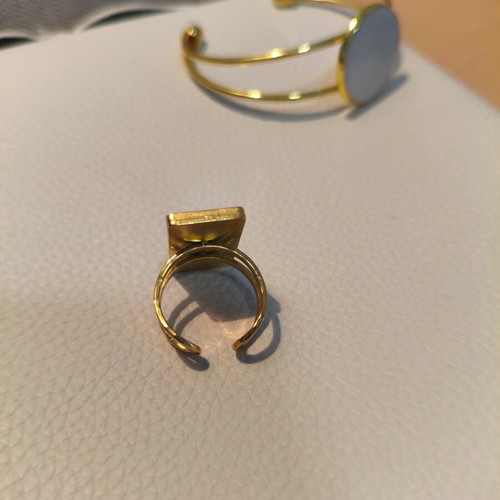 Handmade adjustable statement ring with white resin and gold base