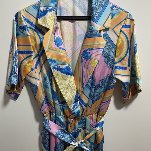 Printed jumpsuit like new with belt at waist, short sleeves, size M
