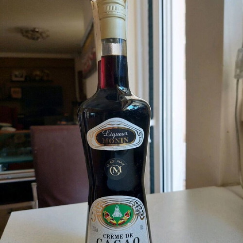 Creme de Cacao liqueur sealed old bottle like new