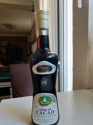 Creme de Cacao liqueur sealed old bottle like new